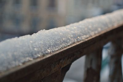 Close-up of snow on brick wall