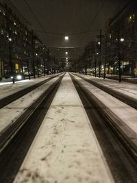 Railroad tracks at night