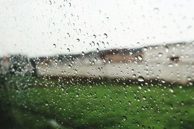 Full frame shot of raindrops on glass window