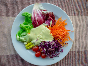 High angle view of salad served on table