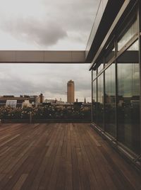 View of buildings against cloudy sky