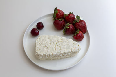 High angle view of strawberries in plate