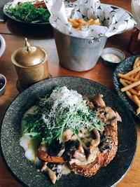 High angle view of fresh meal served on table