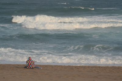 Scenic view of beach and sea against sky