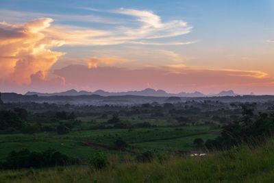 Scenic view of landscape against sky during sunset