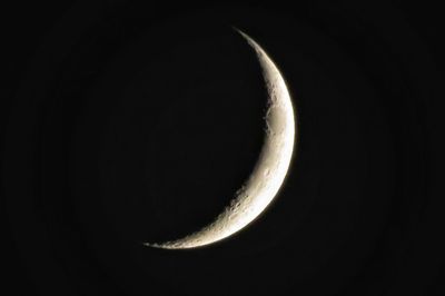 Scenic view of moon against sky at night