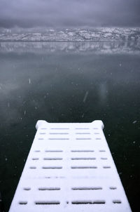 High angle view of pier over sea against sky