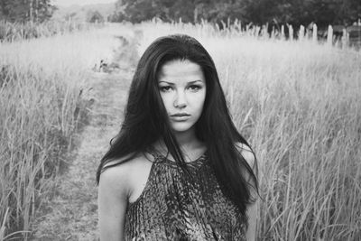 Portrait of woman on field