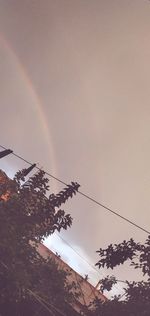 Low angle view of rainbow against sky