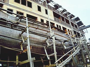 Low angle view of old building against sky