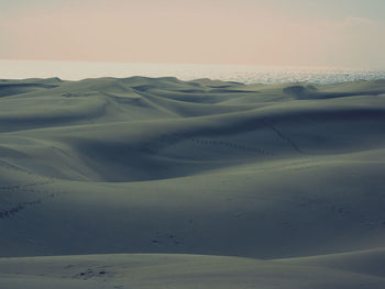 Scenic view of desert against sky