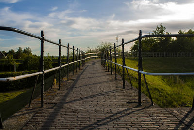 Empty bridge against sky