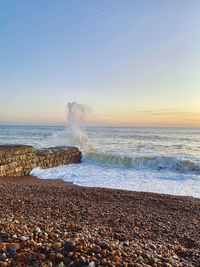 Scenic view of sea against clear sky