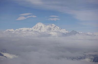 Scenic view of snowcapped mountains against sky