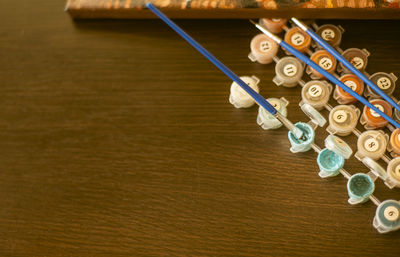 High angle view of piano on table