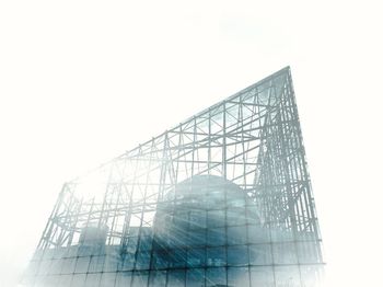 Low angle view of modern building against clear sky