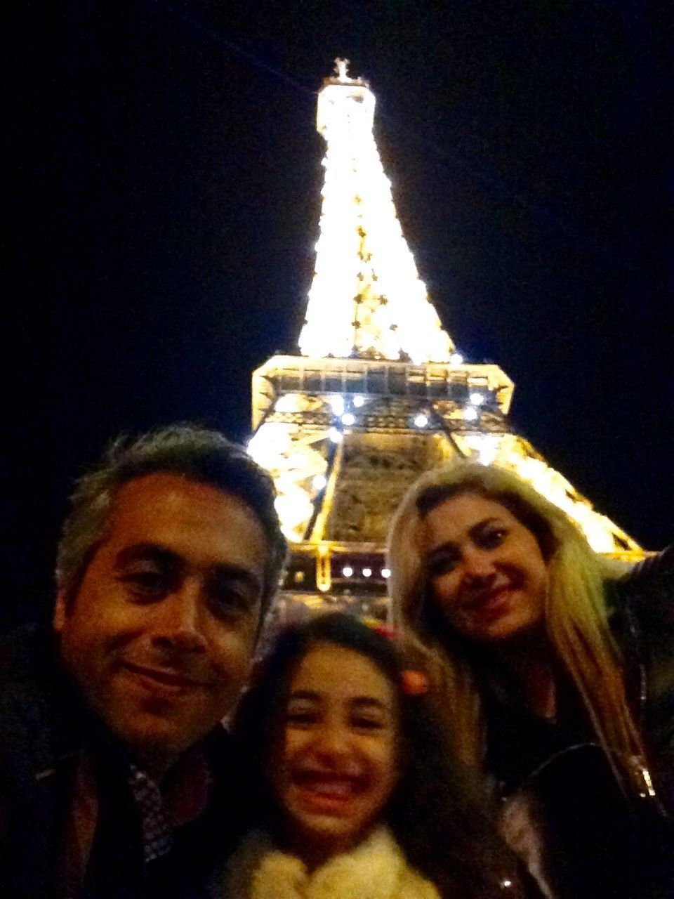 lifestyles, leisure activity, portrait, illuminated, looking at camera, night, person, togetherness, front view, happiness, headshot, young adult, indoors, bonding, smiling, young men, enjoyment