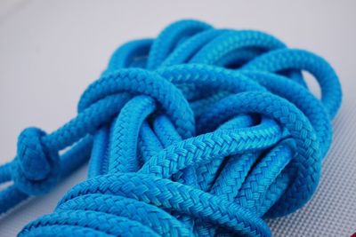 Close-up of blue rope on table