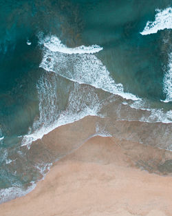 Close-up of wave on beach