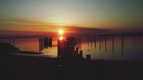 Scenic view of sea at sunset