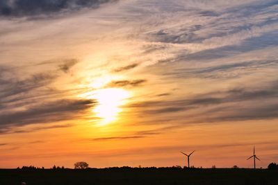 Scenic view of silhouette landscape against sky during sunset