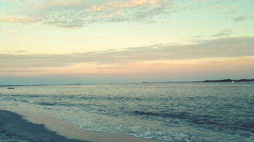 Scenic view of beach during sunset