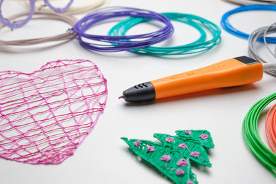 3d pen. colored plastic wire filament. artwork, robotics. steam, stem education. modern technologies