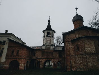 Low angle view of old building against sky