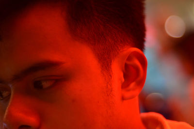 Close-up portrait of a serious young man