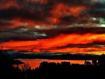 Scenic view of dramatic sky during sunset