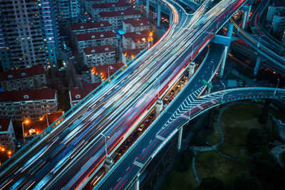 High angle view of illuminated city street at night