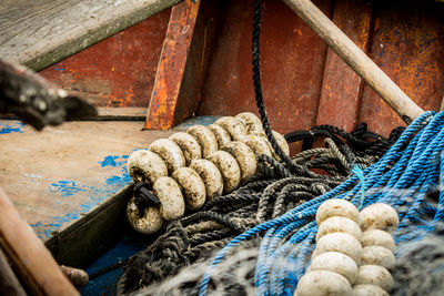 Close-up of rope tied to fishing net