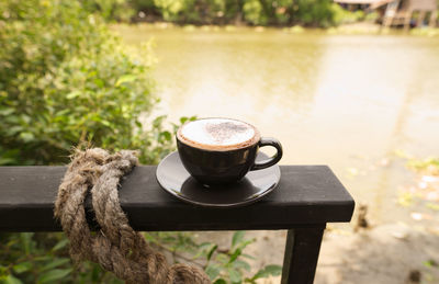 Close-up of coffee cup on table