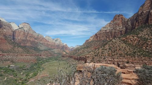 Panoramic view of rocky mountains against sky