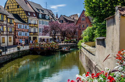 Canal amidst buildings in city