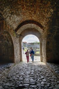 People standing in archway