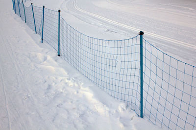 High angle view of snow covered field