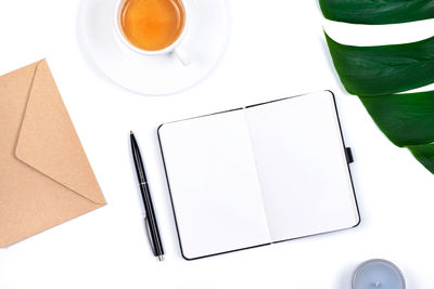 High angle view of coffee cup on table