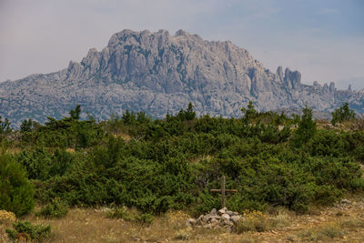 Scenic view of rocky mountains against sky