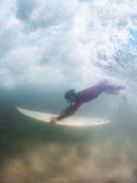 Man swimming in sea