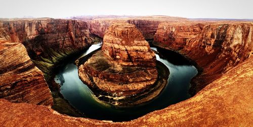 View of rock formations in water