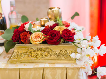 Close-up of roses on table