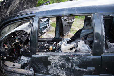 Close-up of abandoned car