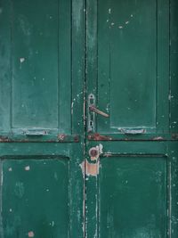 Full frame shot of closed green door