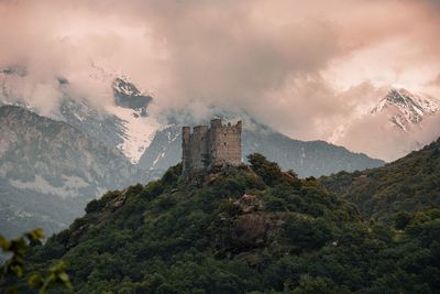 Scenic view of mountains against sky during sunset