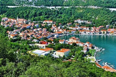 High angle view of townscape and trees in city