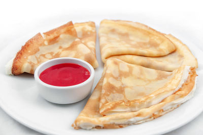 Close-up of served food in plate