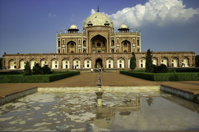 Artistic perspective of humayun tomb architecture against a blue sky located in new delhi