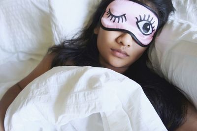 Cute girl lying on bed