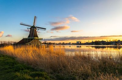 Zaanse schans tradional dutch windmills at sunset, netherlands